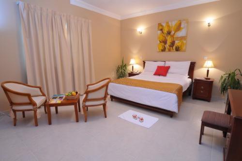 Le Grand Hotel Doha Chambre photo