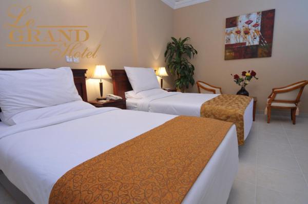 Le Grand Hotel Doha Chambre photo